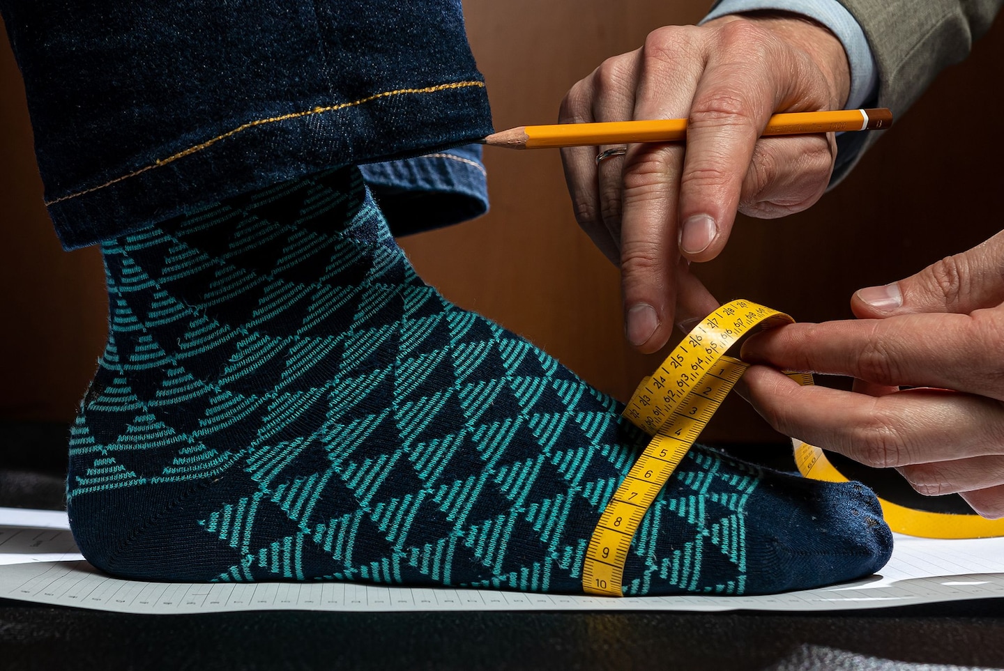 Image of the side of the foot with the front of foot being measured