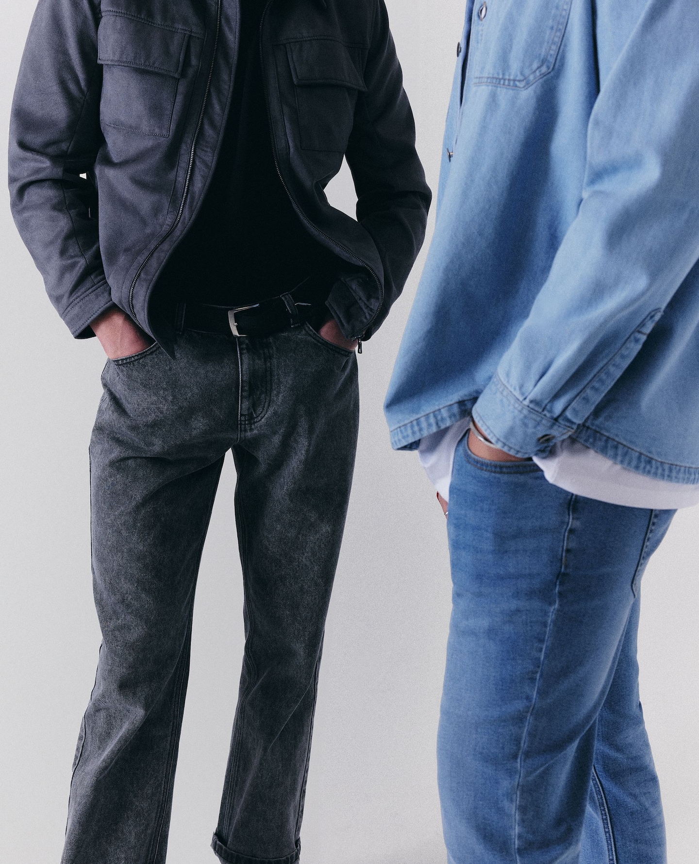 Models stood wearing relaxed fit jeans
