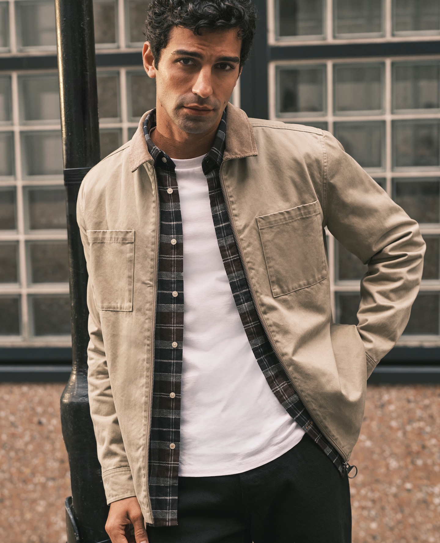 Model wears Jack & Jones Flannel Check Shirt with Cream Jacket and White T-shirt