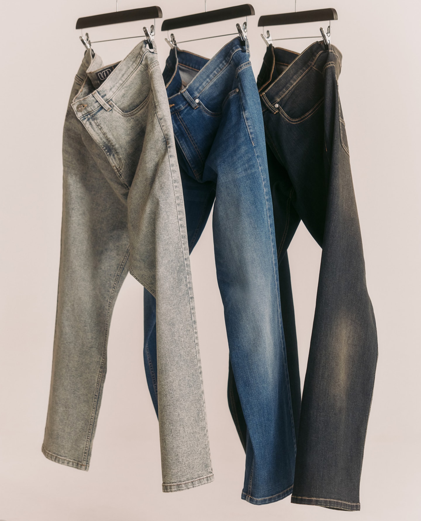 Stonewash, blue and dark jeans are pictured