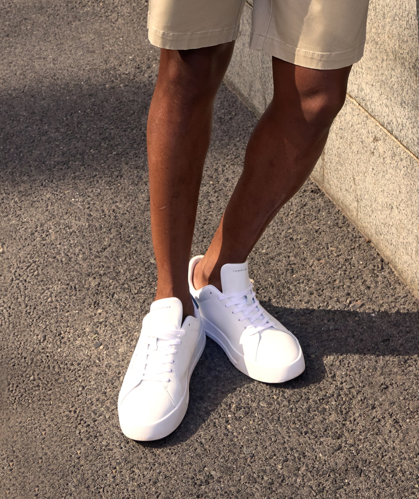 Model wears Tommy Hilfiger Premium Cupsole Leather Trainer - White