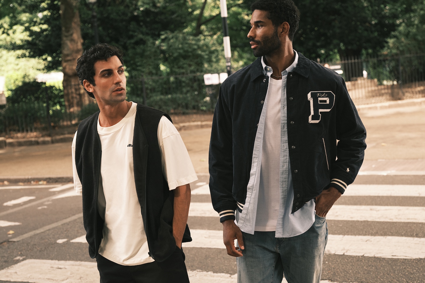 Model wear 90s style clothing including Polo Ralph Lauren Cord Varsity Jacket - Navy