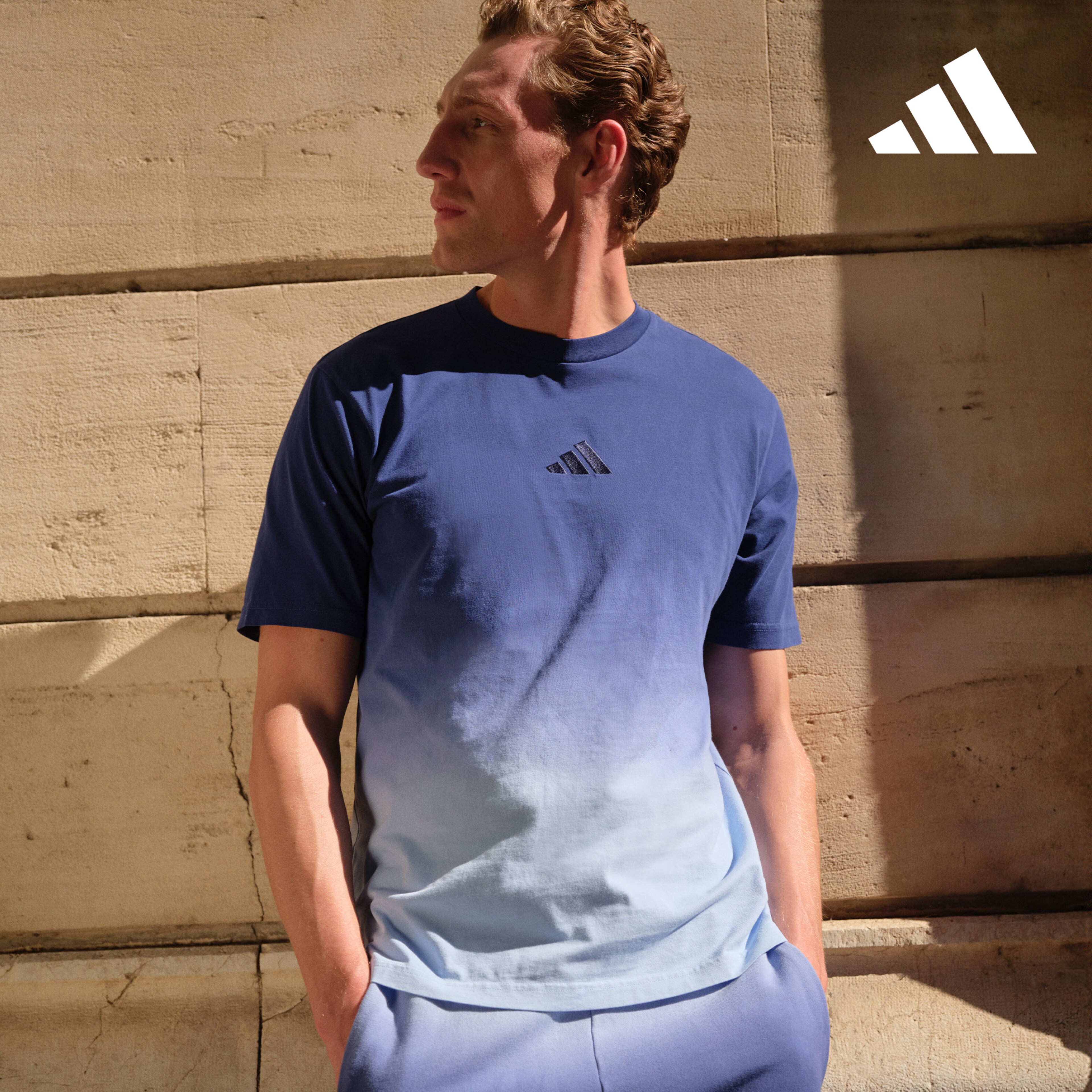 adidas. Model wears adidas ALL SZN Dip Dye T-Shirt with matching shorts