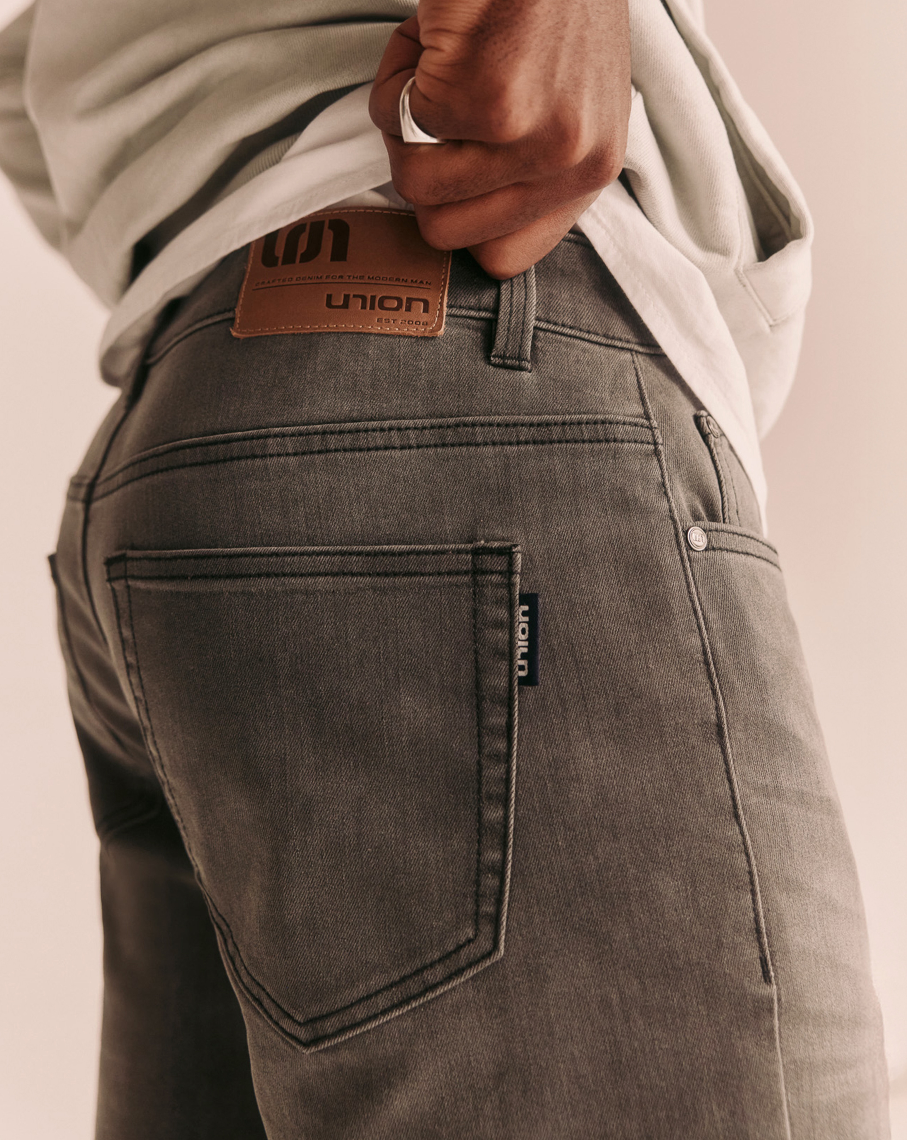 Union Jeans. Model wears Union Loose Fit Stretch Jean
