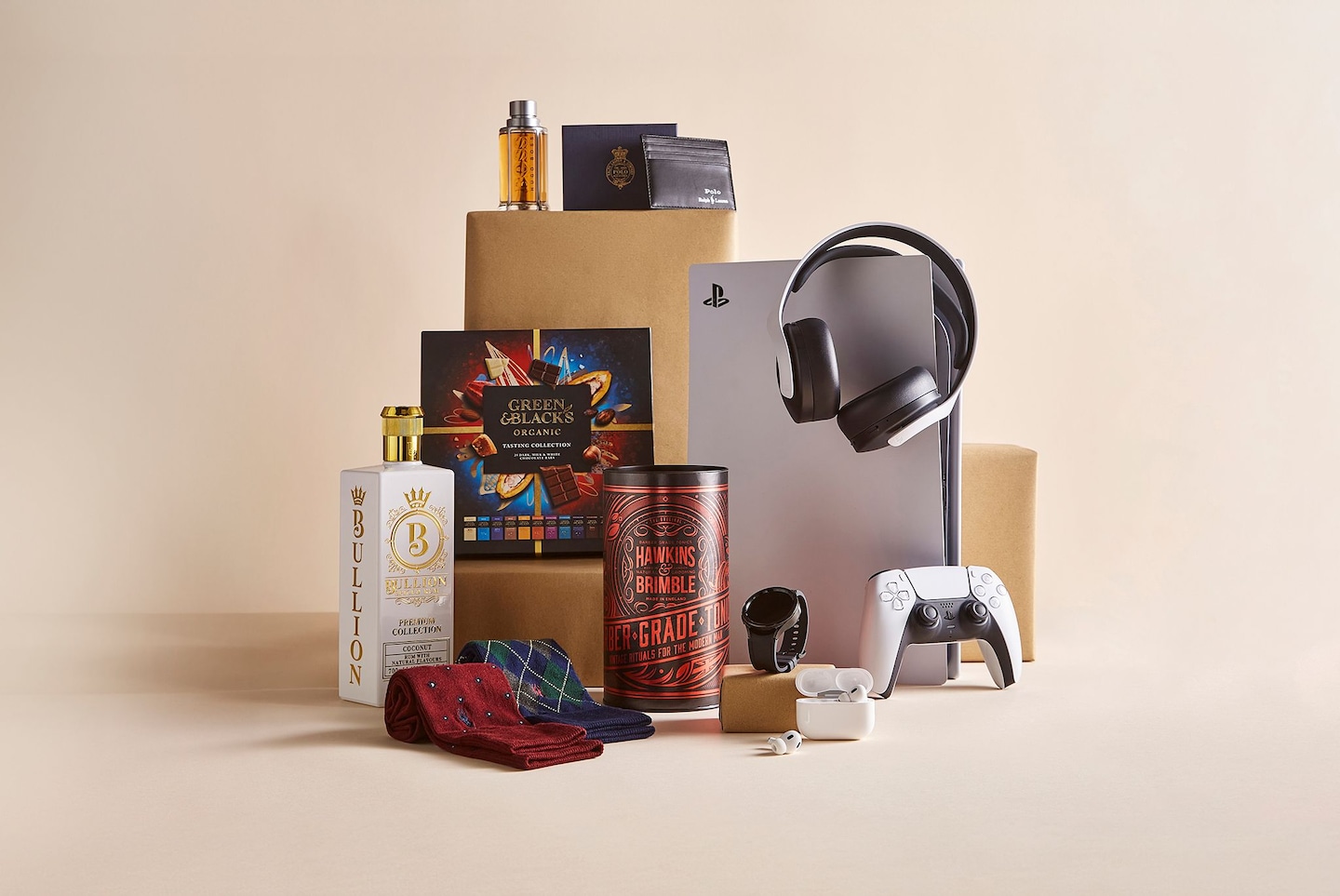 Various gifts displayed including PlayStation5, Apple watch and Green and Blacks chocolates