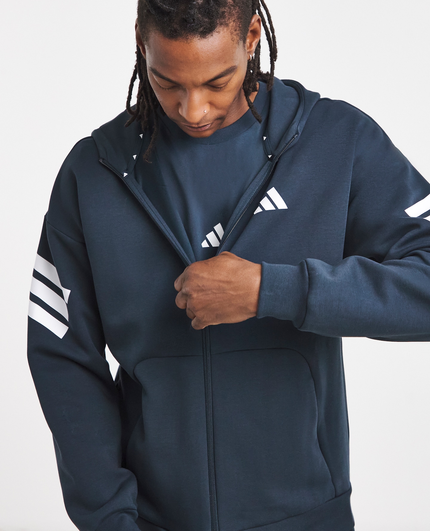 Model wears adidas Fleece 3 Stripe Full Zip Hoodie