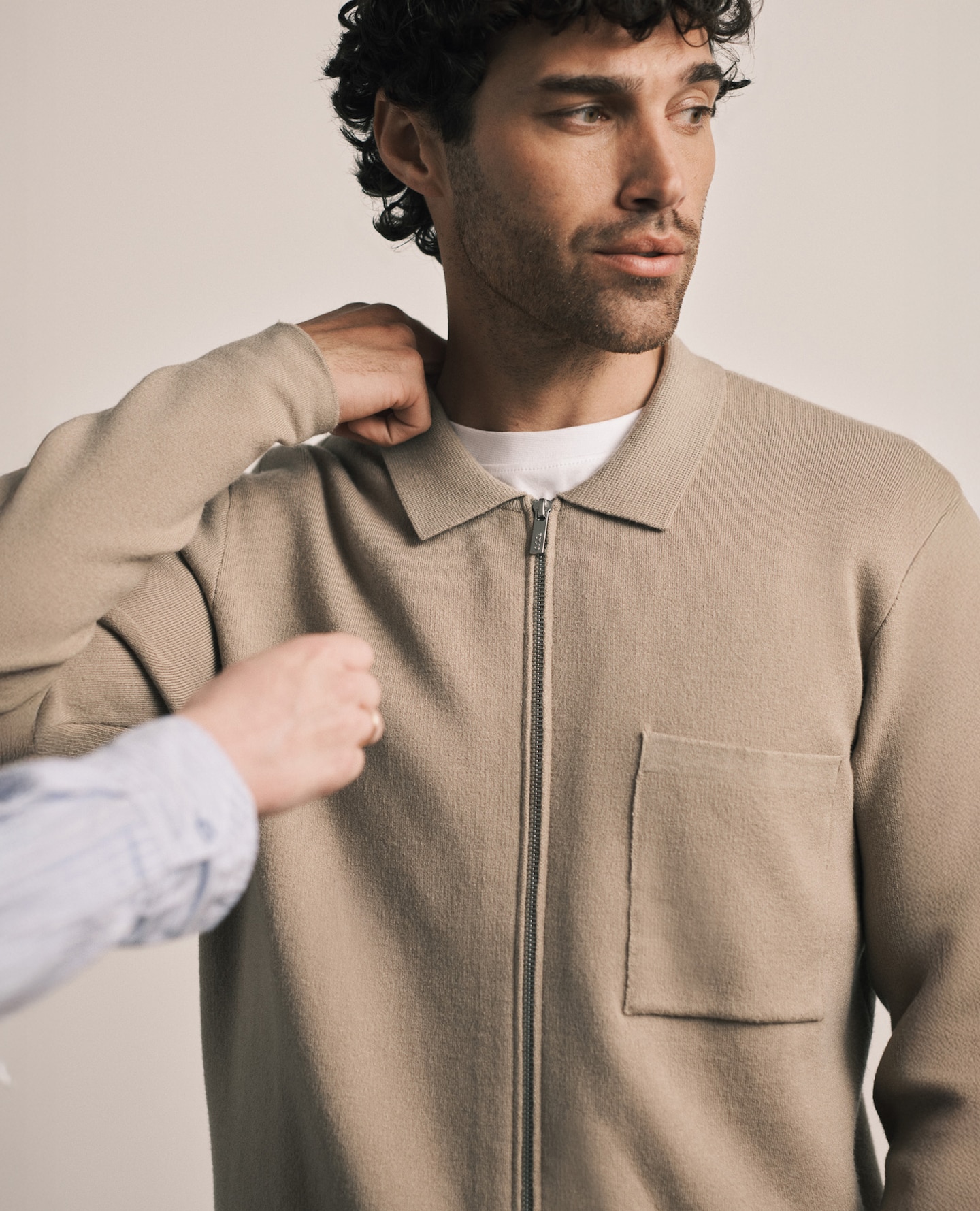 Model wears Folio Folio Interlock Zip Shacket in Cream