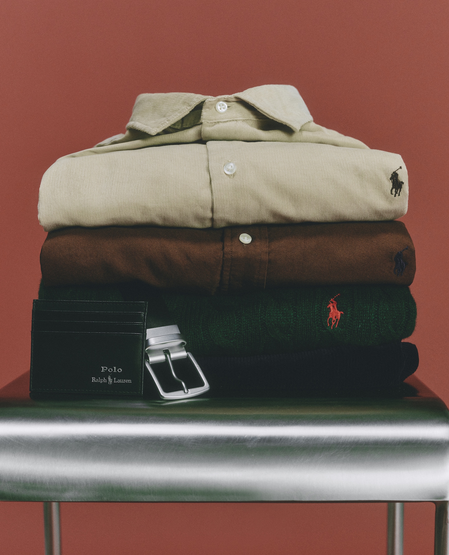 Polo Ralph Lauren shirts are pictured in a pile