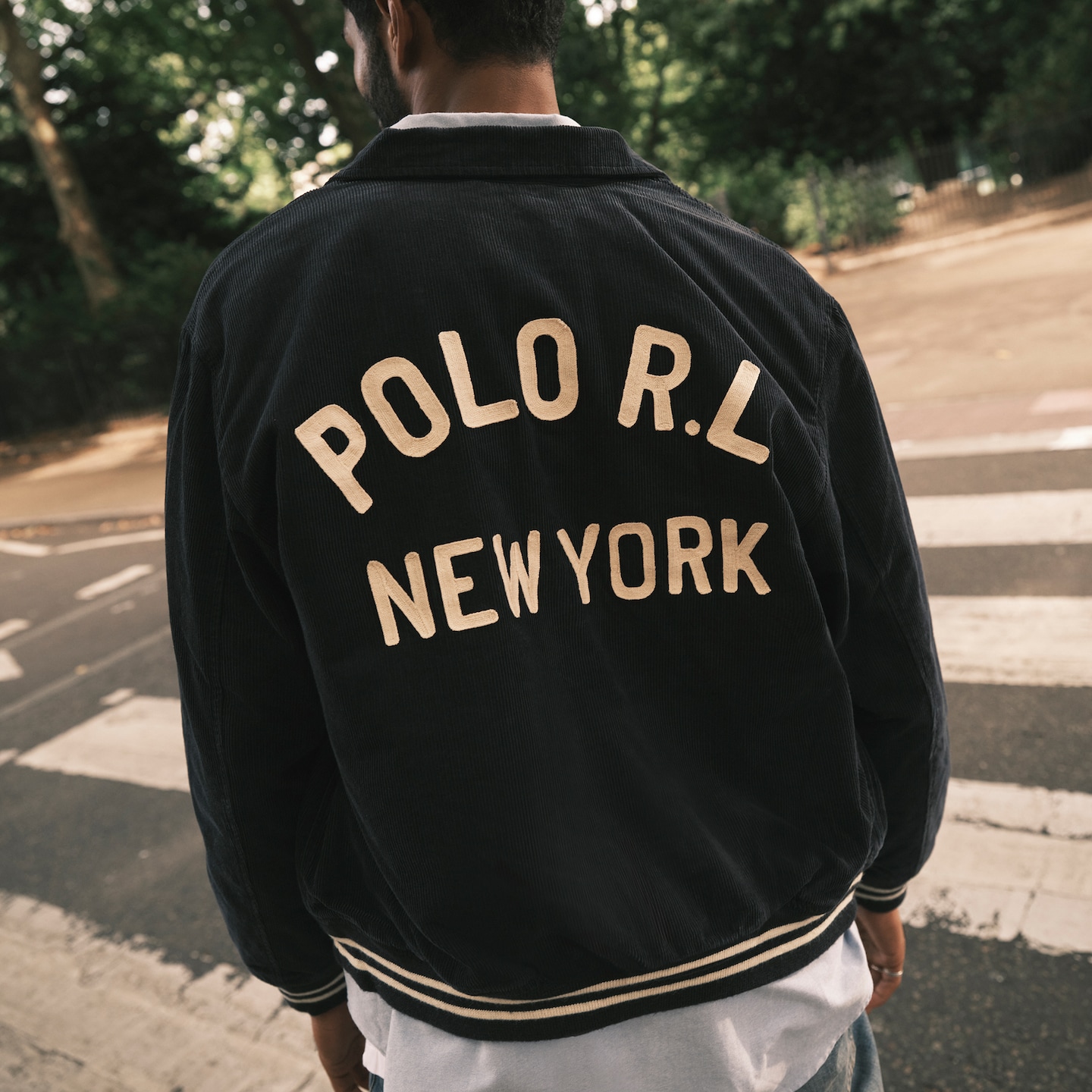Polo Ralph Lauren New York text on a the back of a jacket.