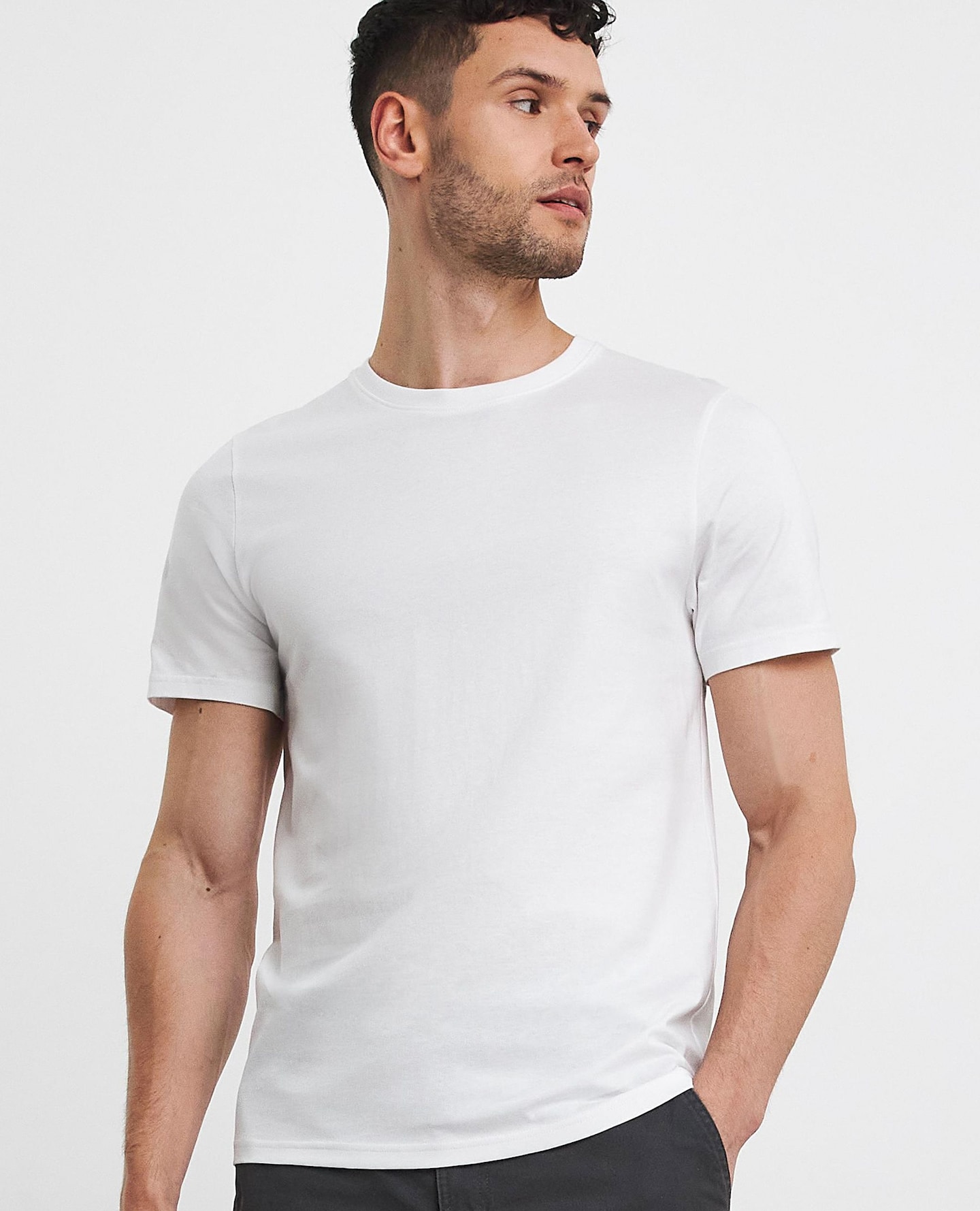 Model wears white t-shirt