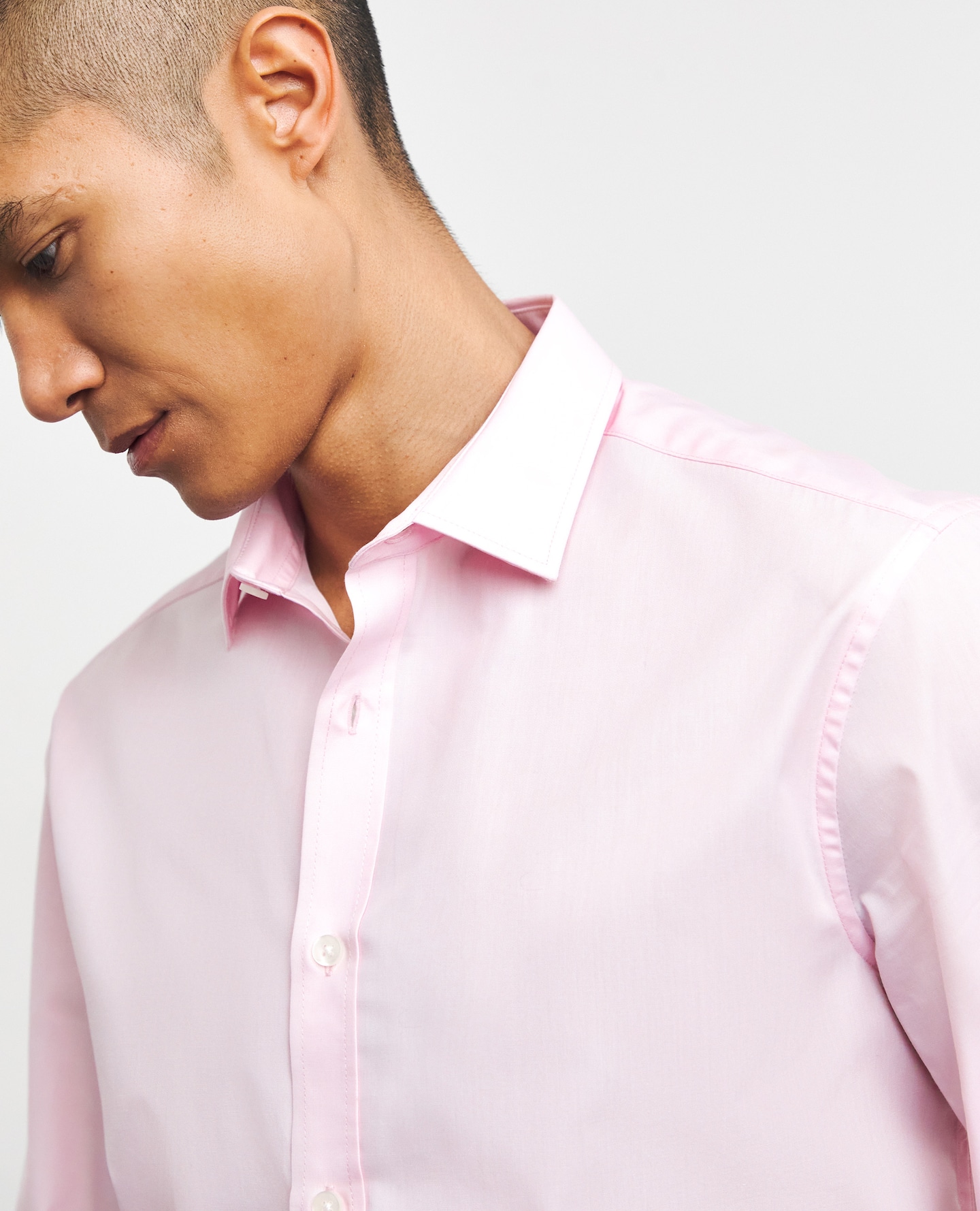 Model wearing pink shirt