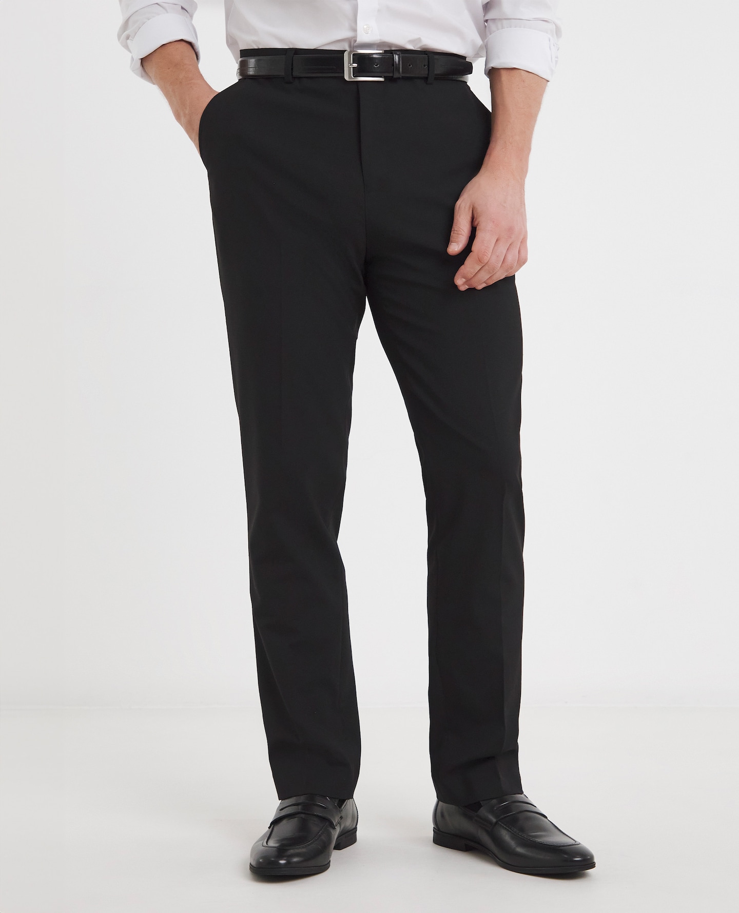 Model wearing black suit trousers