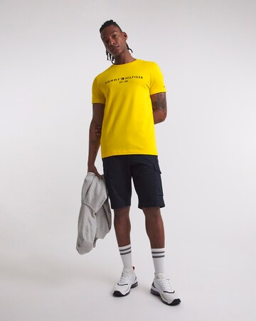 yellow and black tommy hilfiger shirt